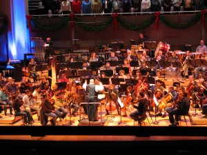 William Henry Curry, Resident Conductor, North Carolina Symphony William Henry Curry, Resident Conductor, rehearses the North Carolina Symphony and Concert Singers of Cary for the Holiday Pops Concert.
